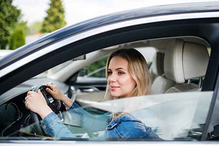 young-woman-driver-sitting-in-car-waiting-2021-08-27-16-14-37-utc